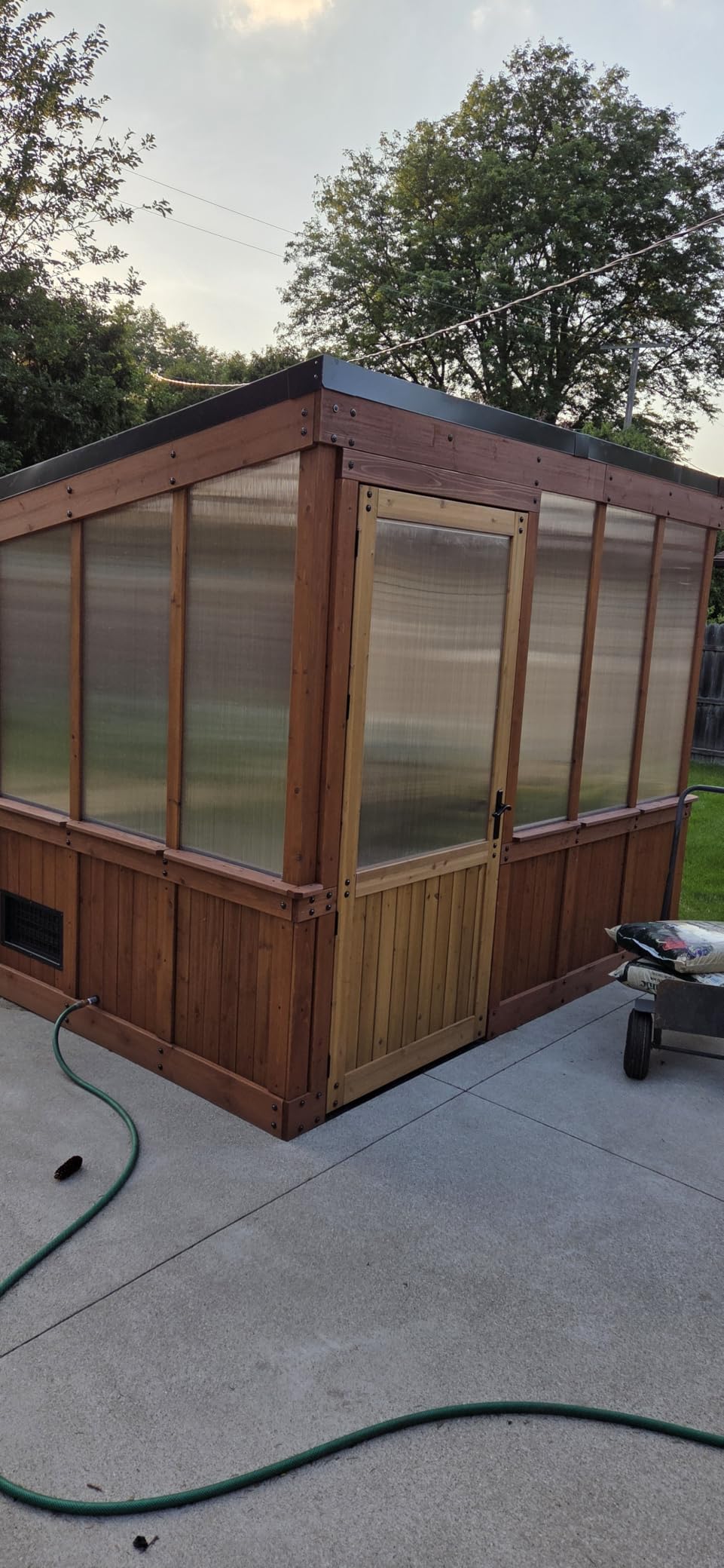 Backyard Discovery Willow 9' x 6' Cedar Wood and Polycarbonate Walk-in Greenhouse Kit with Exhaust Fan, Windows, Hose Hook-Ups, PowerPort, Staging Shelves for Year-Round Outdoor Gardening customer photo 1