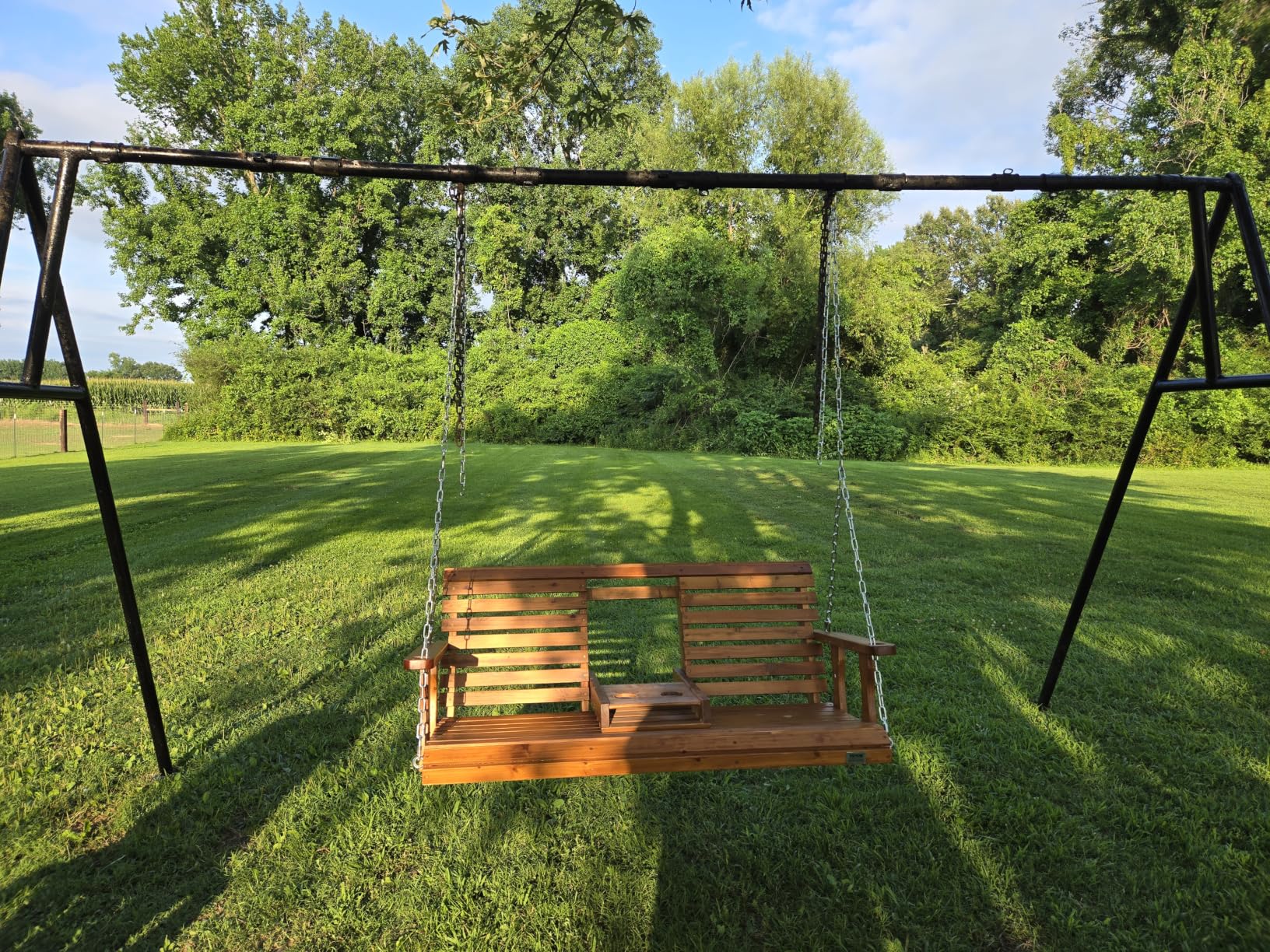 VEVOR Wooden Porch Swing 5 ft, Patio Bench Swing for Courtyard & Garden, Upgraded 880 lbs Strong Load Capacity, Heavy Duty Swing Chair Bench with Hanging Chains for Outdoors, Brown customer photo 1
