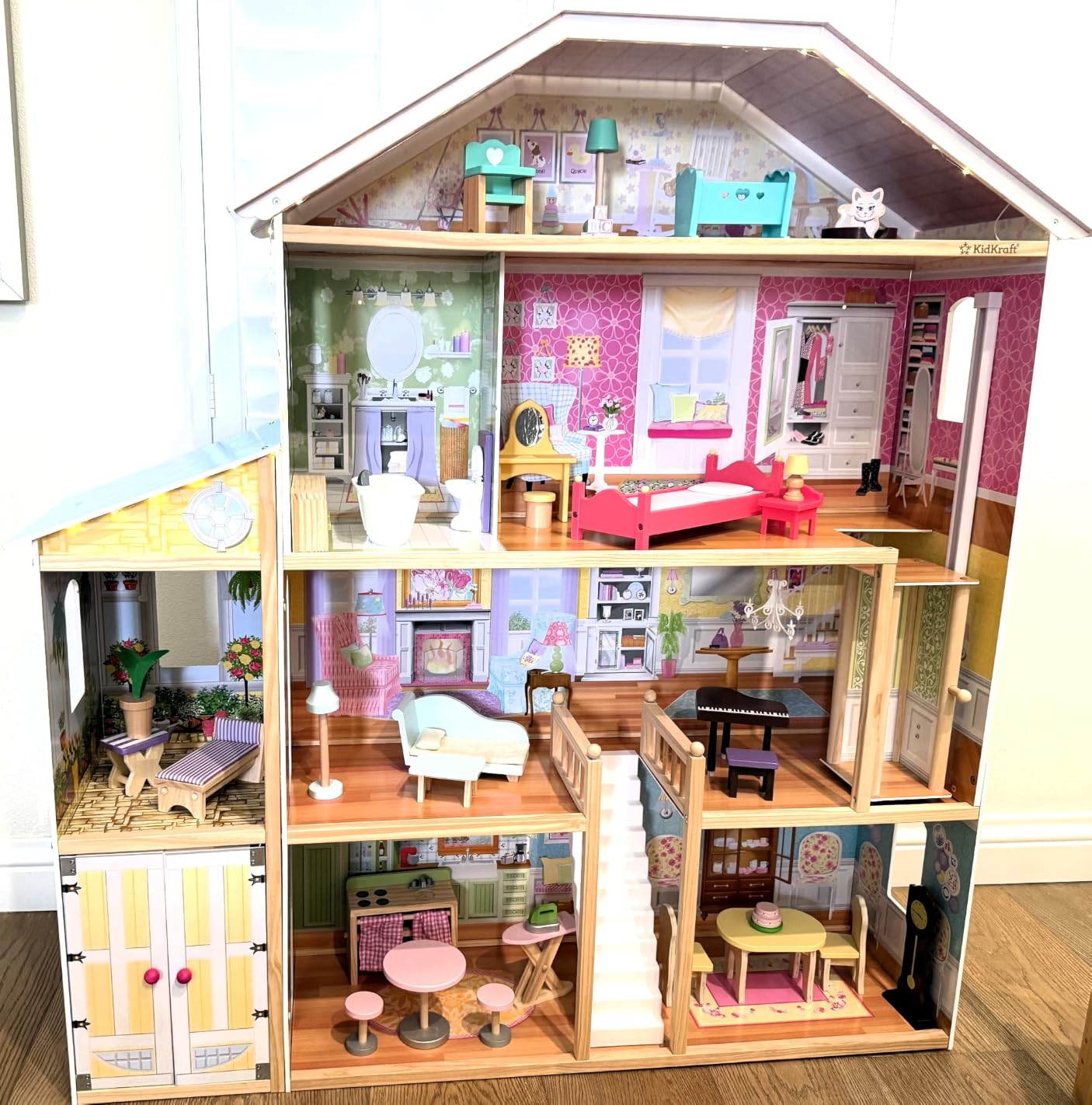 KidKraft Majestic Mansion Wooden Dollhouse with 34 Pieces, Working Elevator | 4 Feet Tall, Garage, 4 Floors, 8 Rooms, Attic Nursery, For Dolls Up to 12 Inches, Gift for Ages 3+ customer photo 1