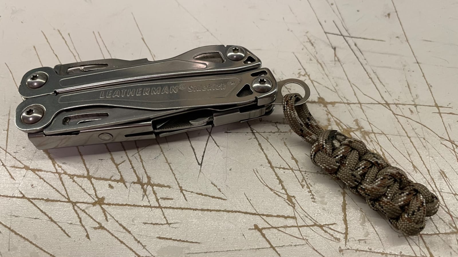 LEATHERMAN, Sidekick Pocket Size Multitool with Spring-Action Pliers and Saw, Stainless Steel customer photo 1