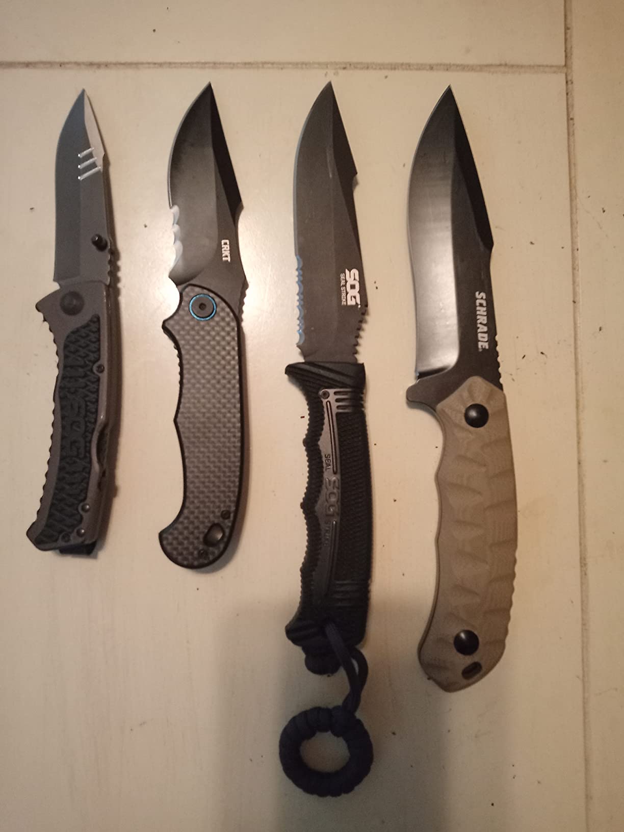 SOG Seal Strike Fixed Blade Knife with Sheath- Tactical and Hunting Knife with 4.9 Inch Partially Serrated Bowie Knife Blade and Survival Knife Line Cutter (SS1003-CP) customer photo 1