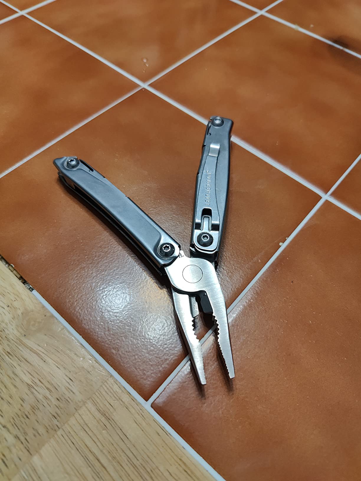 LEATHERMAN, Rev Pocket Size Multitool with Package Opener and Screwdrivers, Stainless Steel customer photo 2