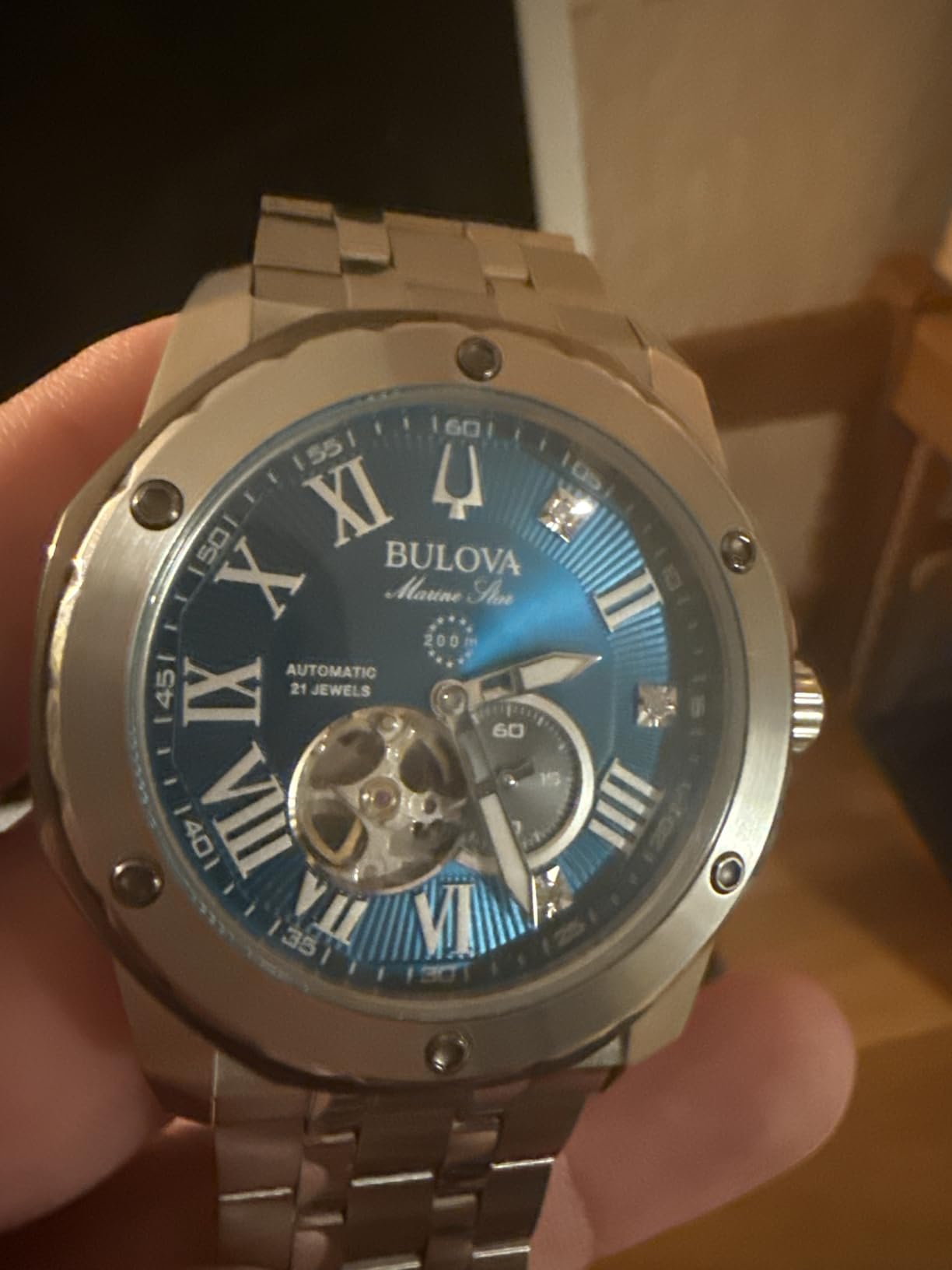 Marc Anthony Men's Automatic Marine Star Stainless Steel Watch, Open Aperture, Exhibition Case Back, Diamond Accent Blue Sunray Dial (Model:98D184) customer photo 1