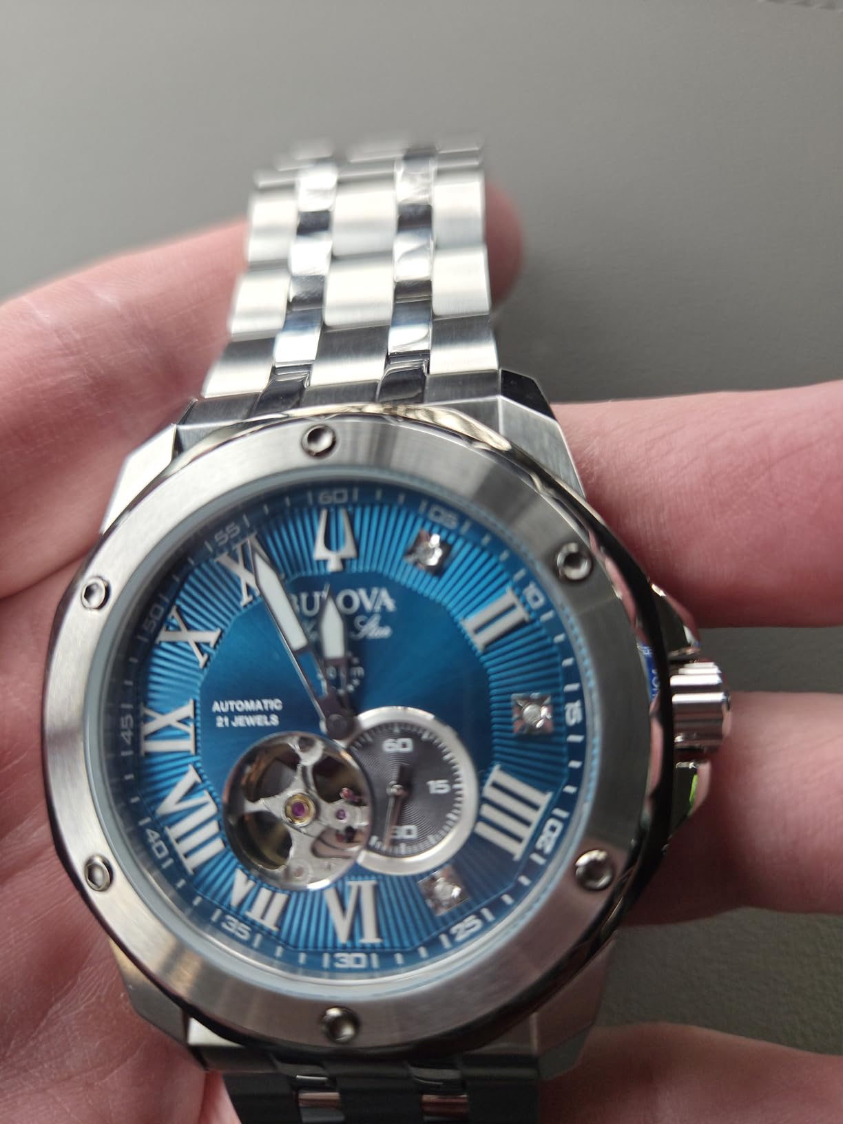 Marc Anthony Men's Automatic Marine Star Stainless Steel Watch, Open Aperture, Exhibition Case Back, Diamond Accent Blue Sunray Dial (Model:98D184) customer photo 2