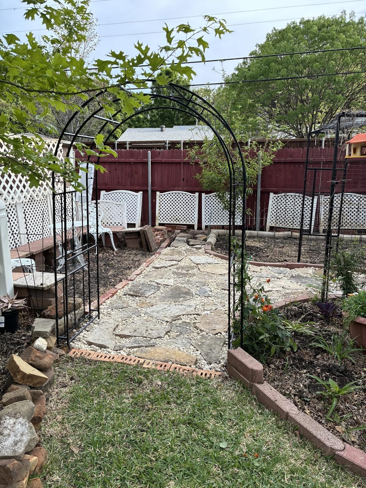 Outvita 7FT Black Metal Garden Arch Arbor with Gate | Heavy duty trellis archway with ground stakes, for climbing roses, patio, wedding & party decor customer photo 1