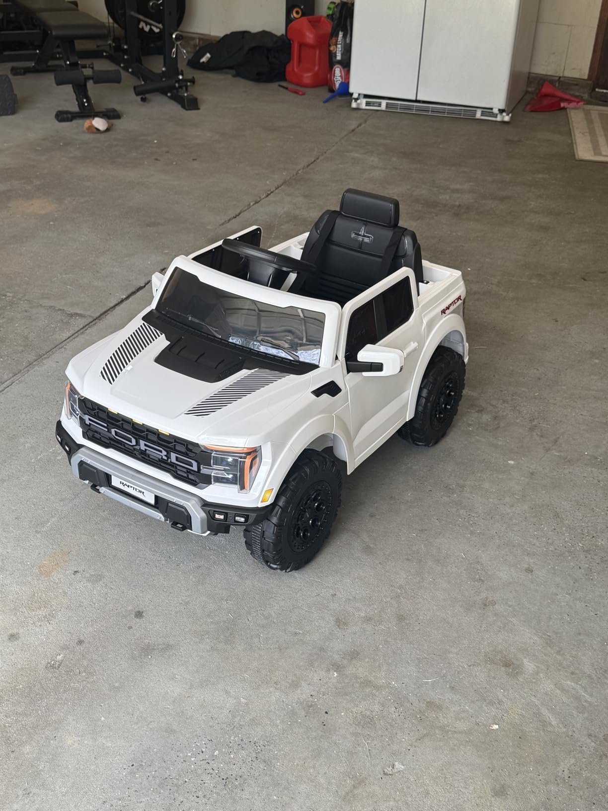 ENYOPRO 12V Kids Ride On Truck, Licensed Ford F-150 Raptor Toddler Electric Car w/Remote Control, Kids Ride On Car Toy w/LED Lights, Bluetooth Music, Lockable Doors, Safety Belt, 2 Speed (Black) customer photo 2