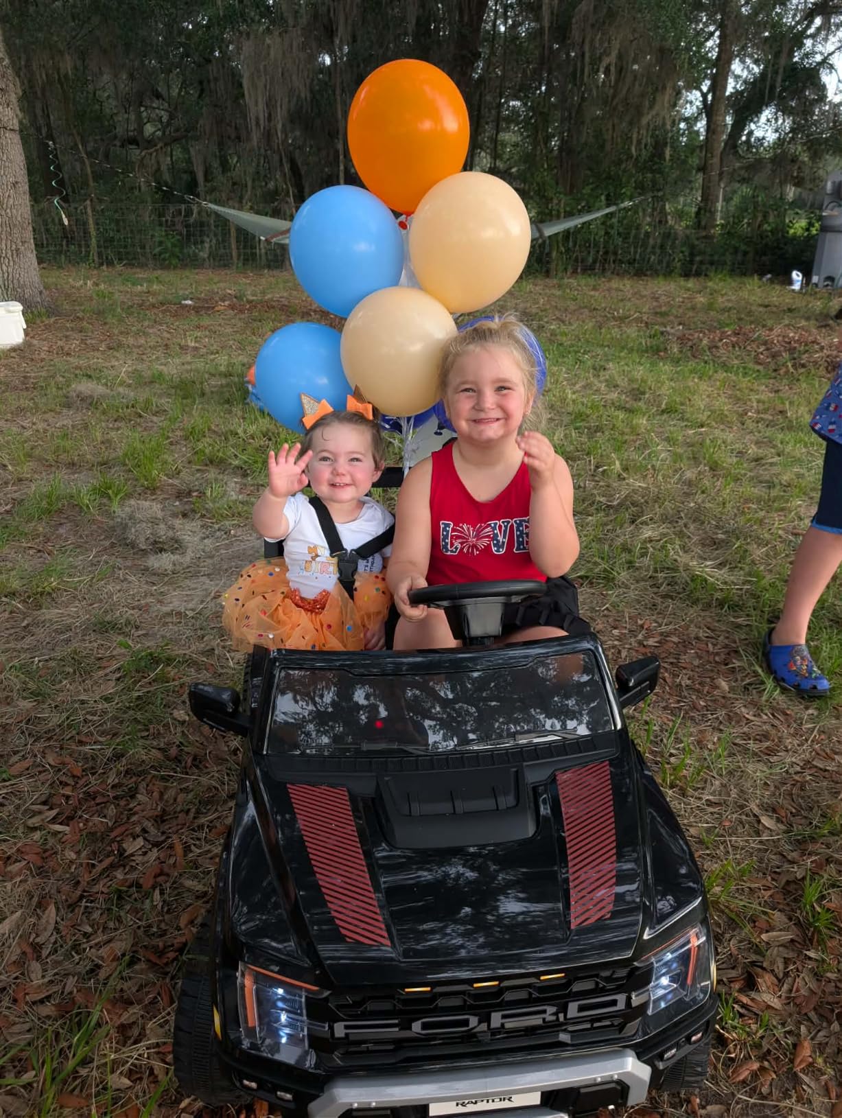 24V 2 Seater Ride on Toys for Kids, Licensed Ford F-150 Raptor Kids Electric Vehicles w/Remote Control, Power Pedal and Durable Wheels, LED Lights, Bluetooth, Truck Bed Storage (Red) customer photo 1