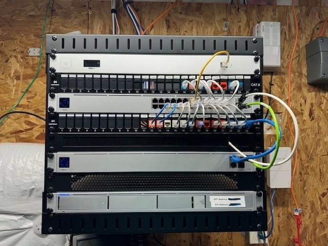 StarTech 12U 2-Post Wall Mount Open Frame Rack, 19in, 200lb (RK12WALLOA) customer photo 1