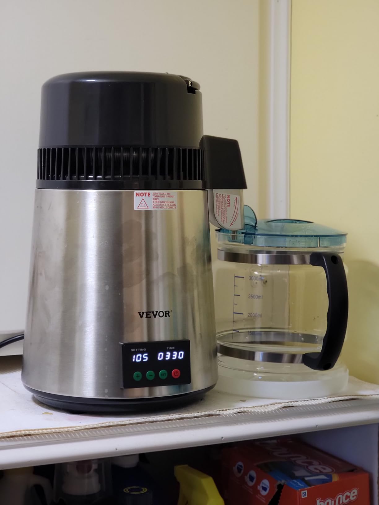 VEVOR 1.1 Gal Water Distiller, 0.3 Gal/H, Distilled Water Maker Machine 750W 0-99H Timing Set Temp Display, 304 Stainless Steel Countertop Distiller Glass Carafe Cleaning Powder 3 Carbon Packs, Silver customer photo 1